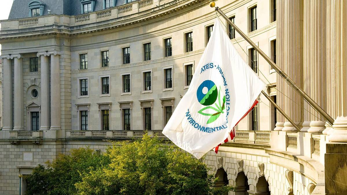 The EPA building. A white flag with the agency's logo flies in front