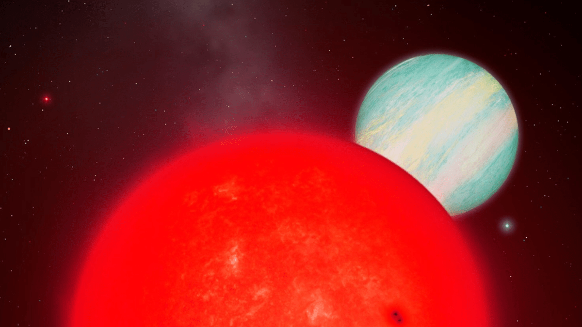 A large red orb partially covers a smaller blue-white orb against a dark, starry background.